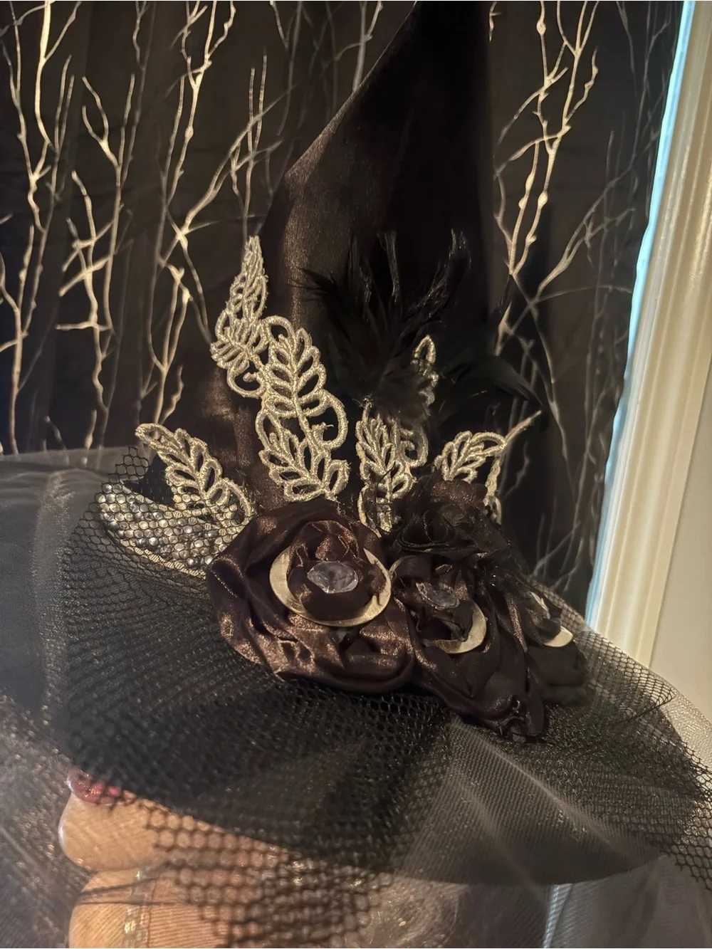 Elegant Black Witch Hat with Veil and Floral Accents unique embellishments